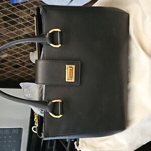 Gorgeous handbag. Buy with free gift included . RESERVED fir for trade